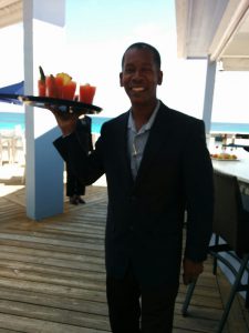 An image of a waiter with the light behind the subject