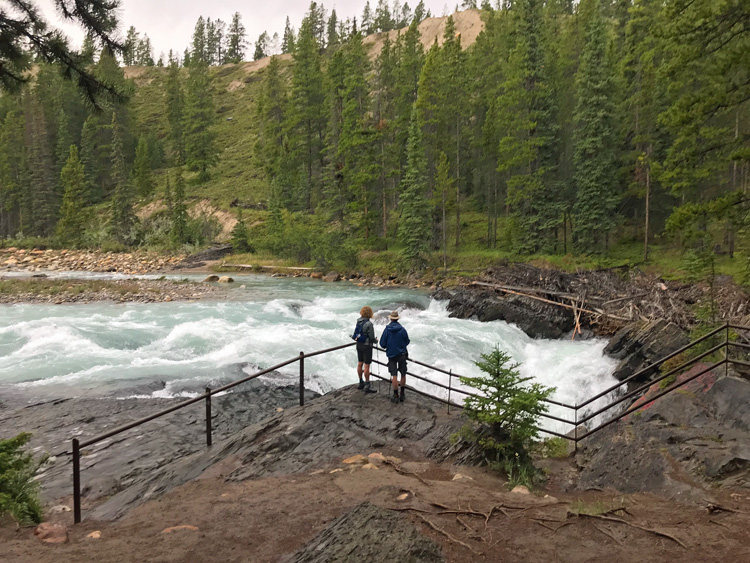 Image of people looking at Siffleur Falls