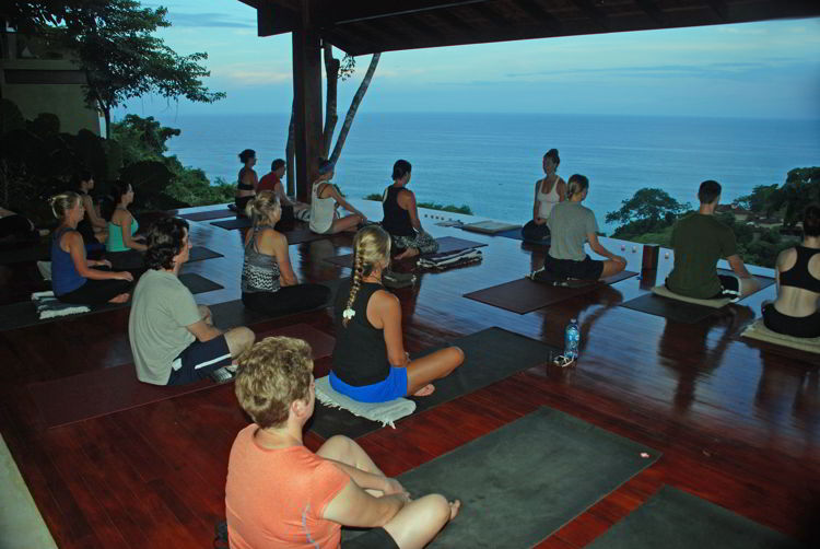 An image of a group of people in a yoga class at Anamaya Resort in Costa Rica - Yoga Retreat Costa Rica