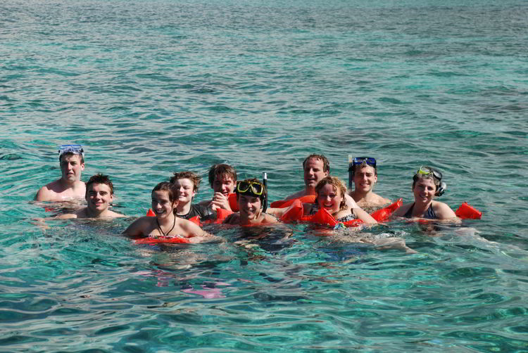 An image of a family snorkeling together in Montego Bay, Jamaica - all inclusive family resorts