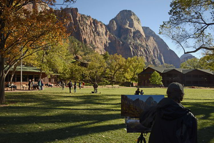 An image of a person painting a landscape in Zion National Park in Utah - Best Zion National Park Hikes