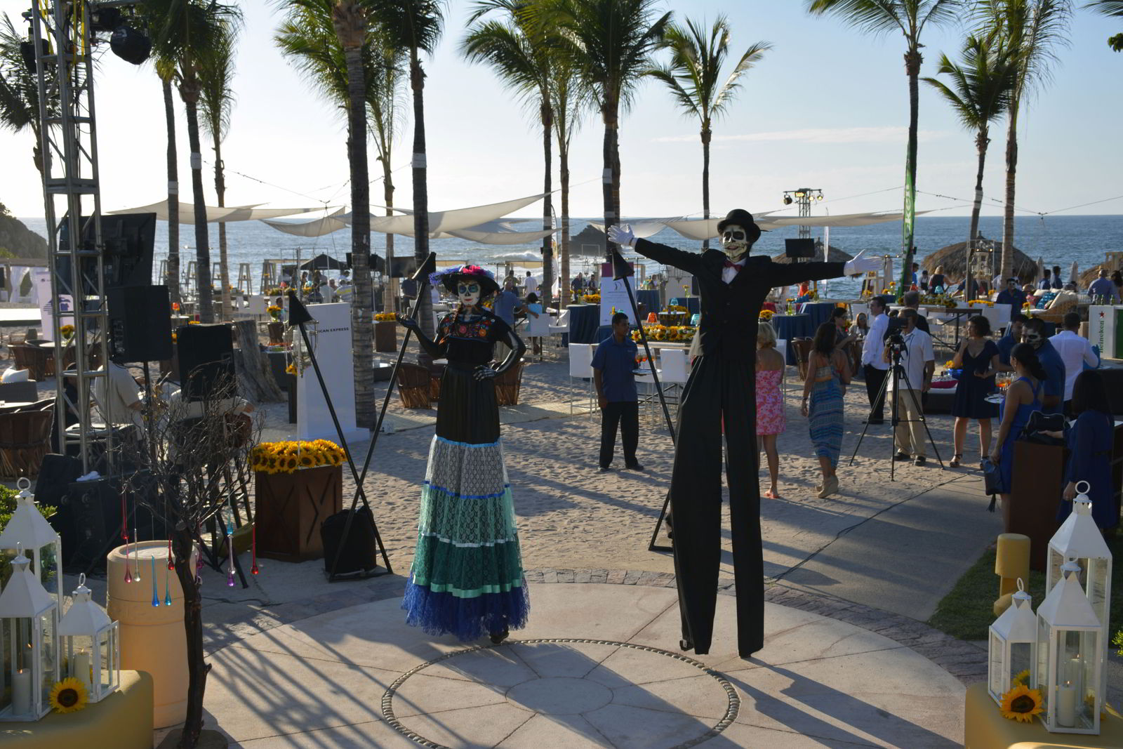 An image of a Day of the Dead party with people dressed in costumes - Day of the Dead Festival -Dia de los Muertos 