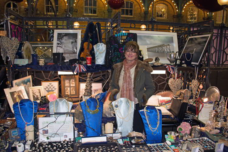 An image of a craft vendor at Covent Garden Christmas market in London - best Christmas markets