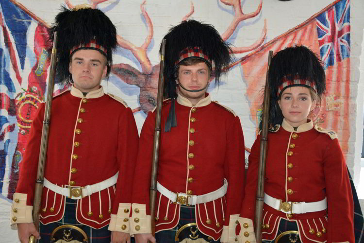 An image of three people dressed as soldiers at the Halifax Citadel in Halifax, Nova Scotia Canada - Halifax Tours