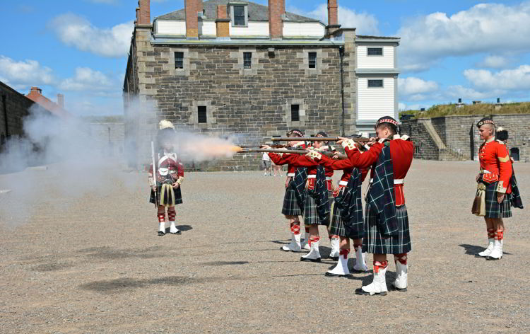 An image of soldiers firing rifles at Halifax Citadel National Historic Site in Halifax, Nova Scotia Canada - Halifax tours