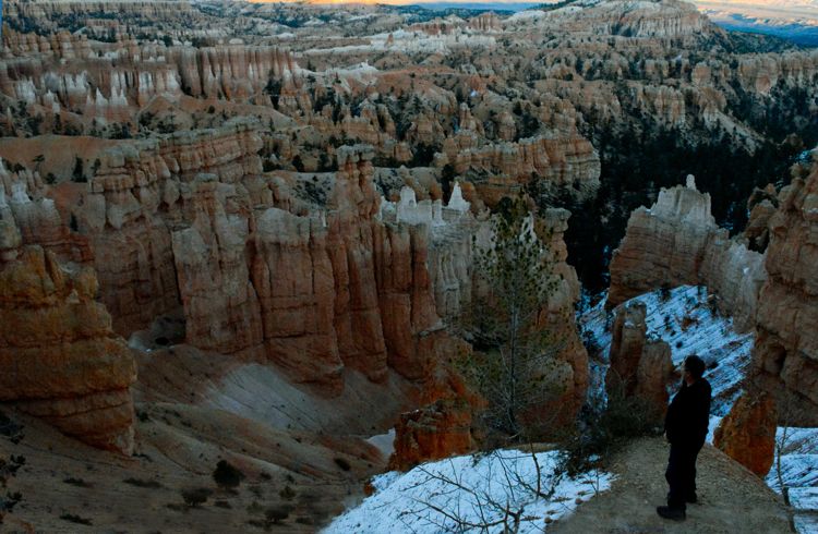 An image of Greg Olsen gazing out at the view from Sunset Point in Bryce Canyon National Park in Utah - best hikes in Bryce Canyon