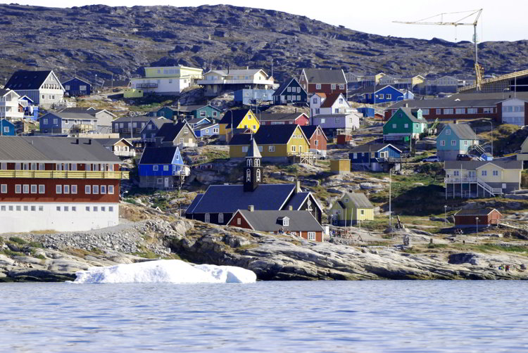 An image of the colorful houses in Ilulissat, Greenland