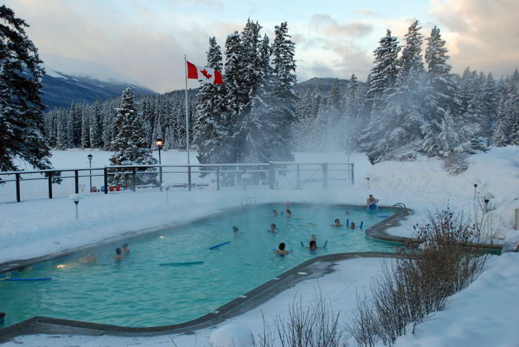 An image of the heated outdoor pool at the Fairmont Jasper Park Lodge in winter  - Jasper in winter - stunning photos