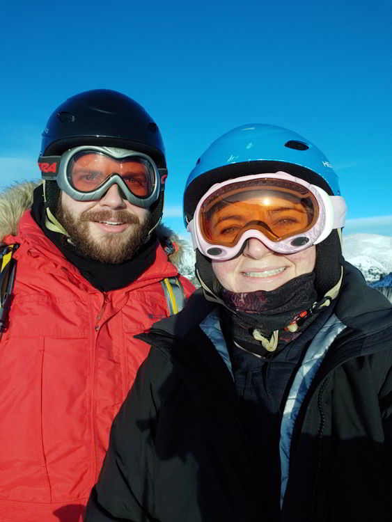 An image of two people in ski helmets and googles at Marmot Basin Ski Resort in Jasper - Jasper Skiing