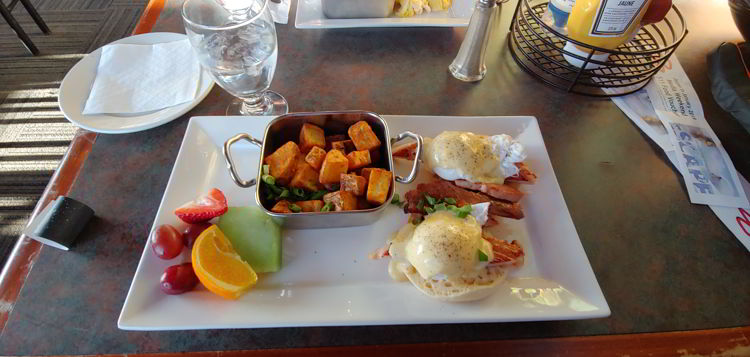 An image of a brunch plate including eggs Benedict at the Caribou Chalet at Marmot Basin in Jasper, Alberta - Jasper Skiing