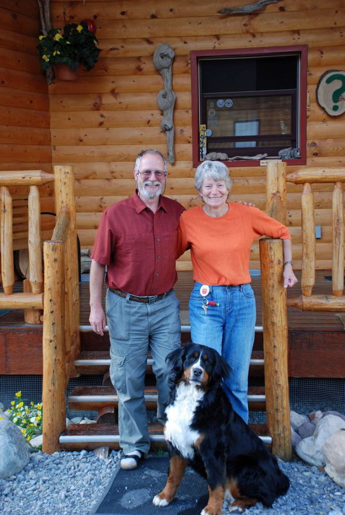 An image of Alan and Madeleine Ernst outside Aurum Lodge - Abraham Lake, Alberta