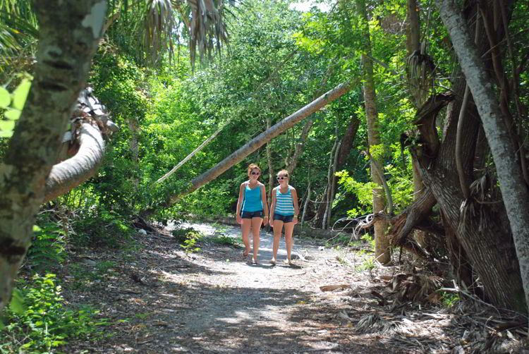 An image of two girls walking on the nature trail on Cabbage Key, Florida - Cabbage Key cheeseburger in paradise