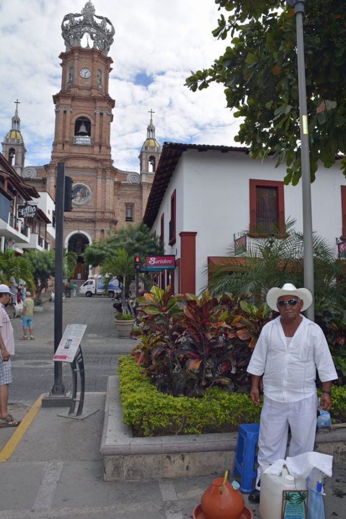 An image of a la tuba salesman named Mr. Concepcion in downtown Puerto Vallarta - the best tacos in Puerto Vallarta
