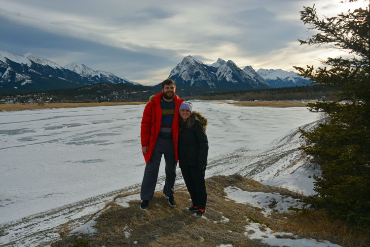 An image of a couple standing at Preacher's Point near Abraham Lake, Alberta