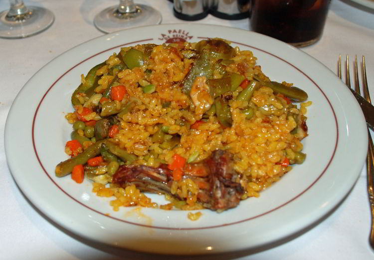 An image of a plate of paella in Spain - Trafalgar Tours Europe