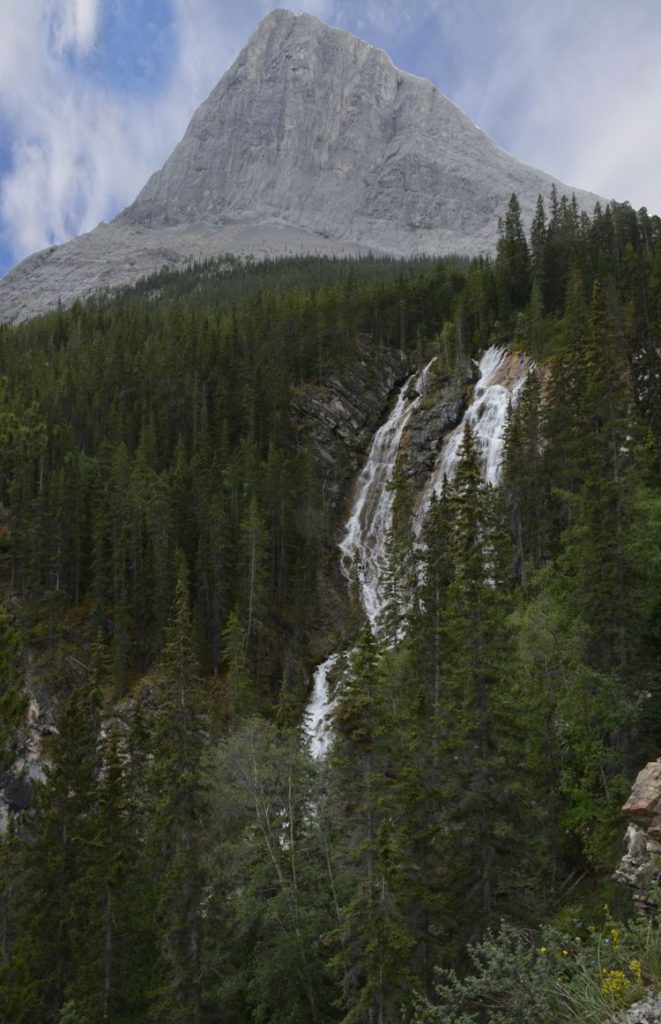 An image of the waterfall on the Grassi Lakes hike near Canmore, Alberta.