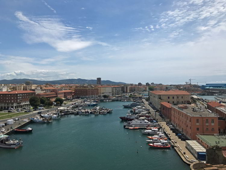 An image of boats focked in the Livorno cruise port in Livorno, Italy. 