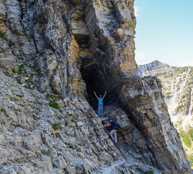 An image of the steel ladder and the cave on the Crypt Lake hike in Waterton Lakes National Park in Alberta, Canada.