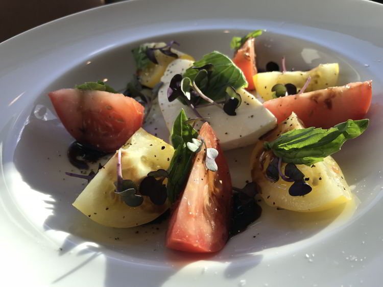 An image of the caprese salad at Red Rock Trattoria in Waterton Lakes National Park - things to do in Waterton. 