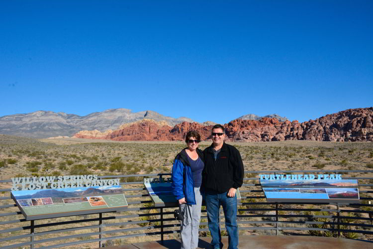 An image of two people standing outside the visitor center at Red Rock Canyon near Las Vegas. 