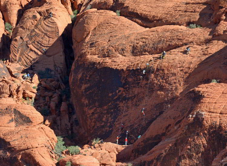 An image of a group of hikers climbing in Red Rock, just outside Las Vegas, Nevada.