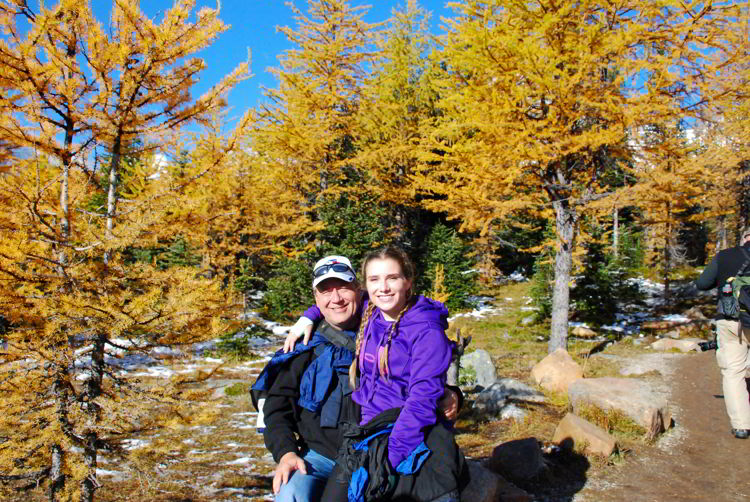 An image of a father and daughter on the Larch Valley hike in Banff national Park, Alberta, Canada. 