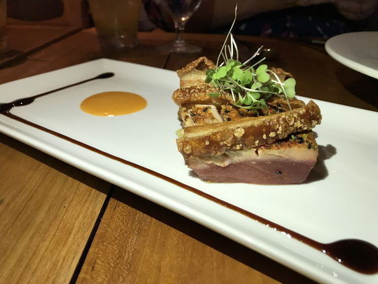 An image of the pork belly appetizer at the Mauka Makai restaurant in Kāʻanapali, Maui.   