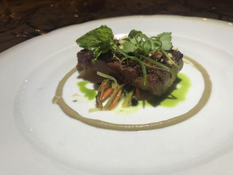 An image of a main course beef dish at the Hawaii Food and Wine Festival event at the Hyatt Regency Maui Resort in Kāʻanapali. 