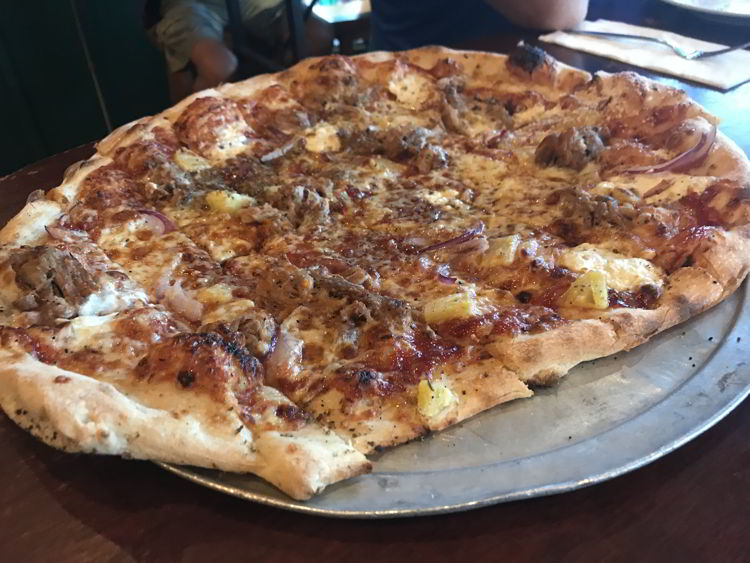 An image of the Hawaiian pizza at the Flatbread Company in Paia, Maui. 