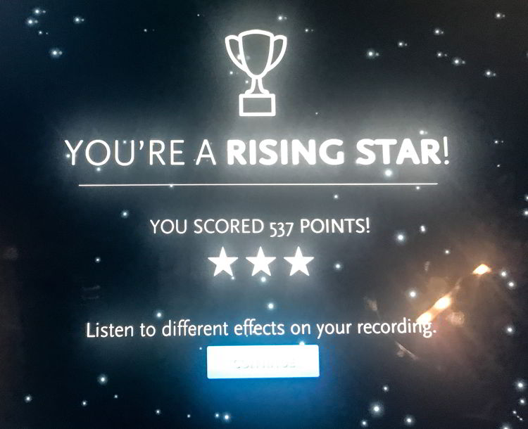 An image of a computer screen that says "you're a rising star" at Studio Bell in Calgary, Alberta, Canada. 