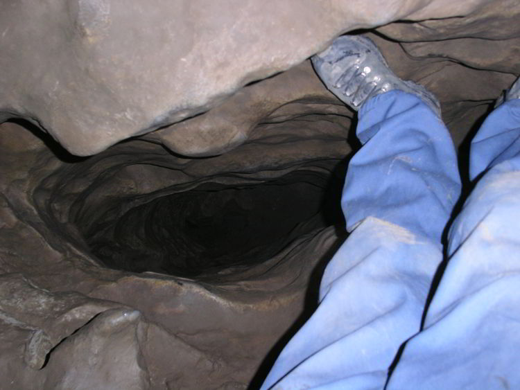 An image of the laundry chute inside the Rat's Nest Cave near Canmore, Alberta , Canada