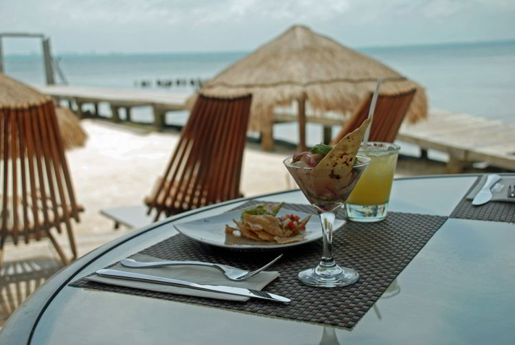 An image of ceviche at Capitán Dulché Beach Club restaurant - Isla Mujeres tour.