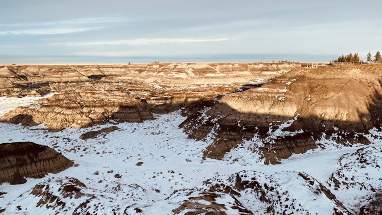 An image of the view from Horseshoe Canyon Overlook during the winter at sunset - Alberta
