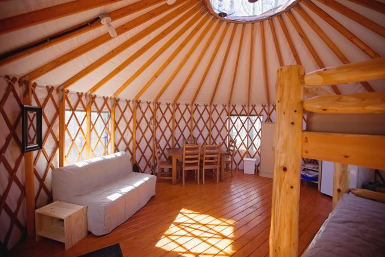 An image of the interior of a yurt at Pigeon Lake Provincial Park in Alberta, Canada. 
