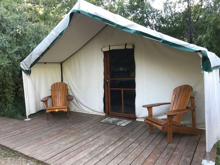 An image of a comfort camping tent at Writing-on-Stone Provincial Park in Alberta, Canada.