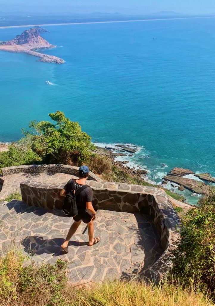 An image of a man taking in the views on the hike to El Faro Lighthouse in Mazatlan, Mexico. 