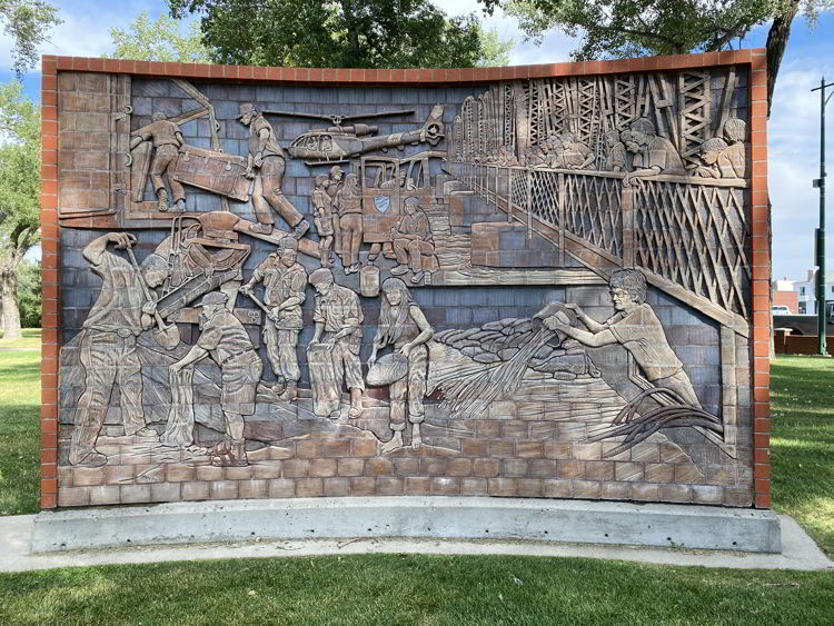 An image of a James Marshall mural in medicine Hat, which commemorates the 1995 flood. 