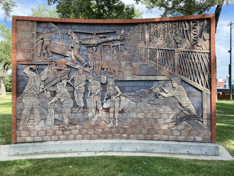 An image of a James Marshall mural in medicine Hat, which commemorates the 1995 flood.