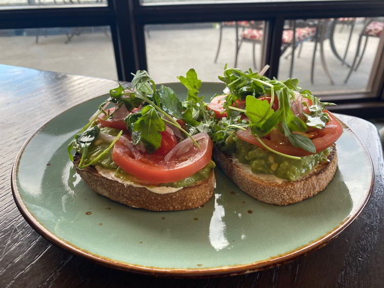 An image of the avocado toast at the Great Hall Gastropub at the Fairmont Jasper Park Lodge. 