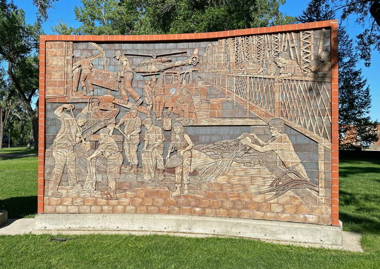 A historic stone mural depicting the 1995 flood in Medicine Hat, Alberta, Canada. 