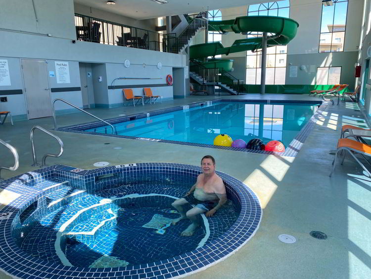 An image of the pool and waterslide at Holiday Inn Hotel & Suites in Medicine Hat, Alberta, Canada.