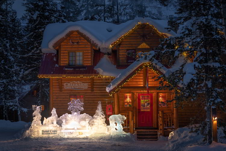 An image of an ice sculpture in front of Baker Creek Mountain Resort in Banff National Park near Lake Louise, Alberta. 