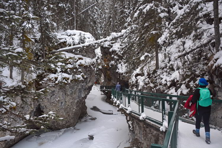 An image of hiking Johnston Canyon in winter in Banff National Park in Alberta, Canada. 