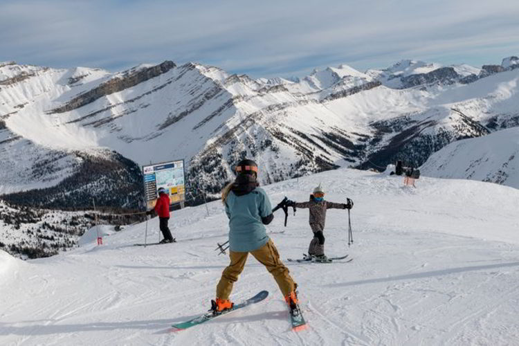 An image of people skiing at Lake Louise Ski Resort in Banff National Park in Alberta, Canada.