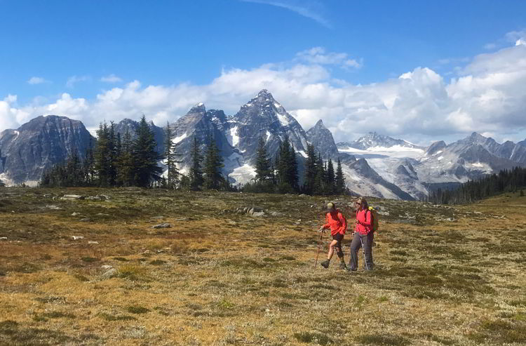 An image of two hikers in the Purcell Mountains in British Columbia, Canada.