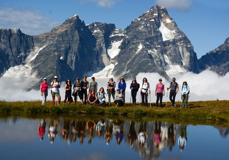 An image of a group of women hiking in the Purcell Mountains of British Columbia, Canada.