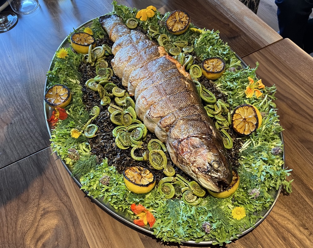 A picture of a cooked trout at Terra Restaurant Jasper.