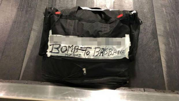 An image of a bag labelled bomb to Brisbane
