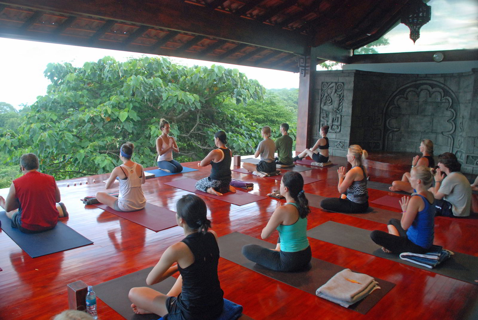 An image of a group of people participating in a yoga class at Anamaya Resort in Costa Rica - Yoga Retreat Costa Rica