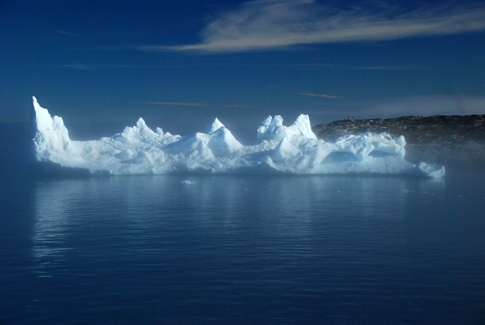 An image of an iceberg in the fog near Ilulissat, Greenland